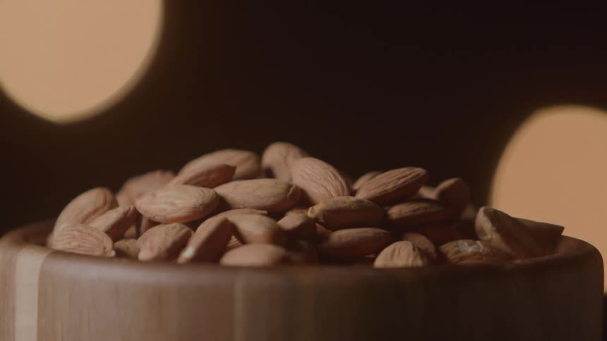 Series of nuts on a spinning bowl