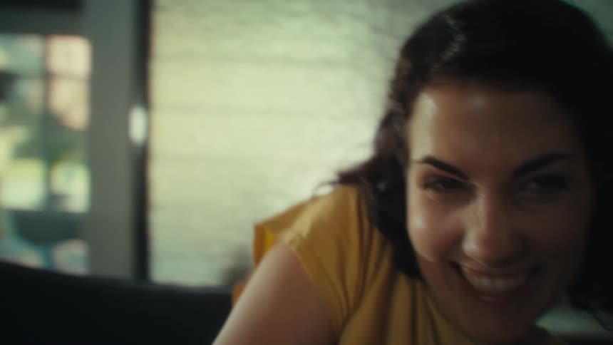 A woman is jumping back and forth having a good time