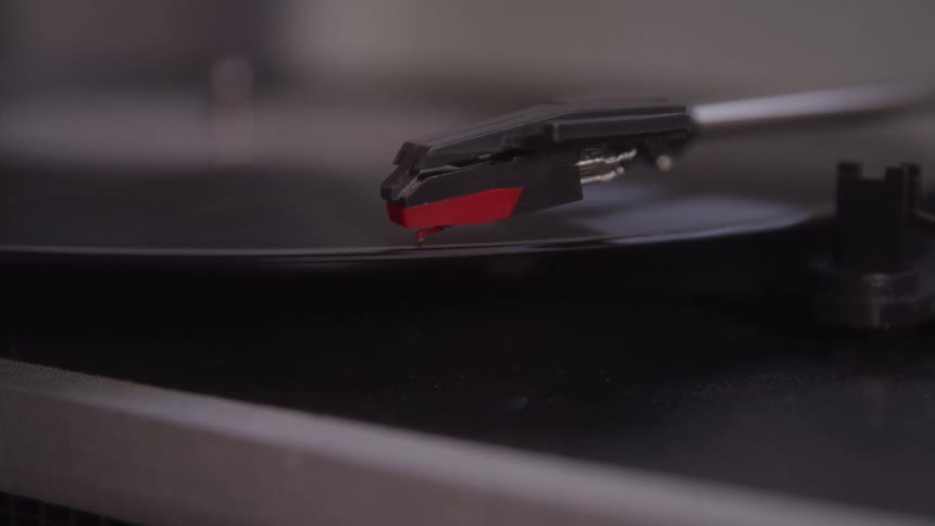 A record player spinning a record