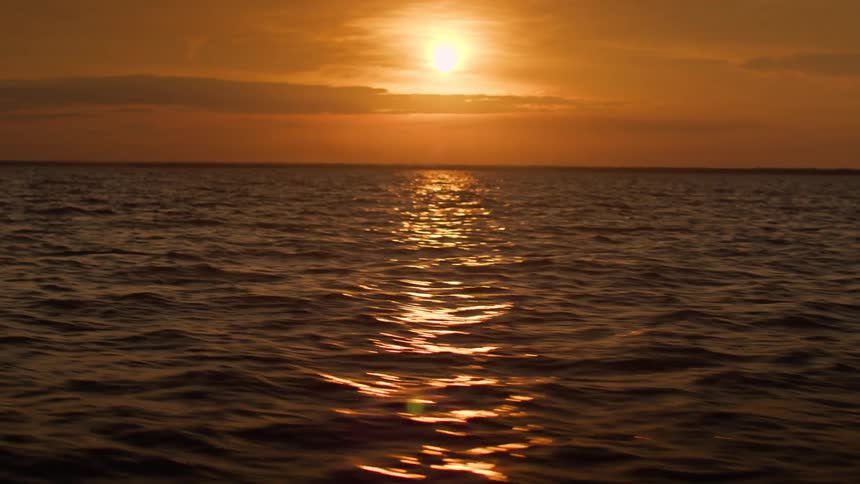 Sunset reflecting on the sea waters