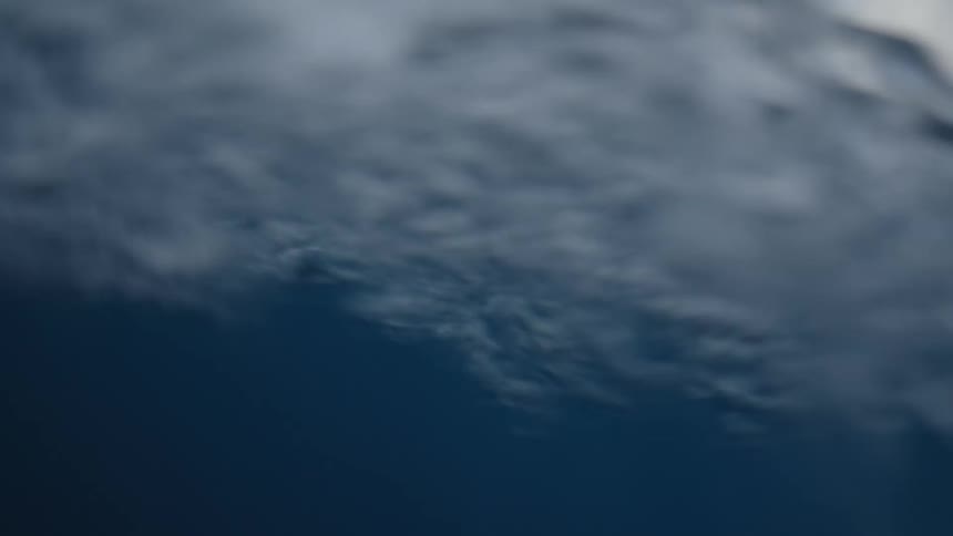 Water rushes past the camera