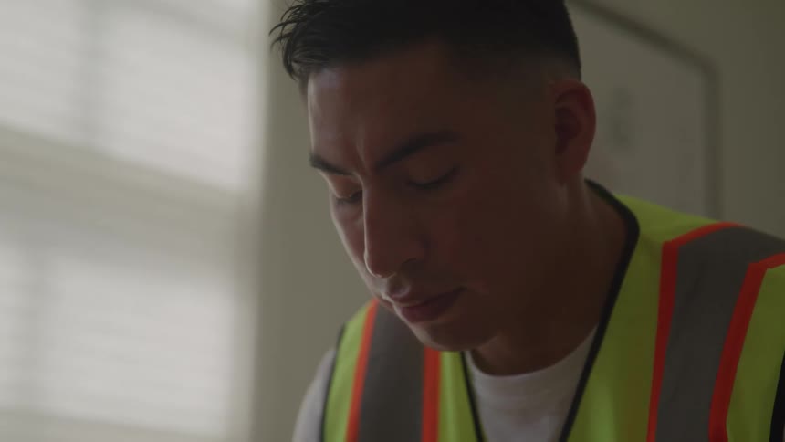 The man slowly looks down