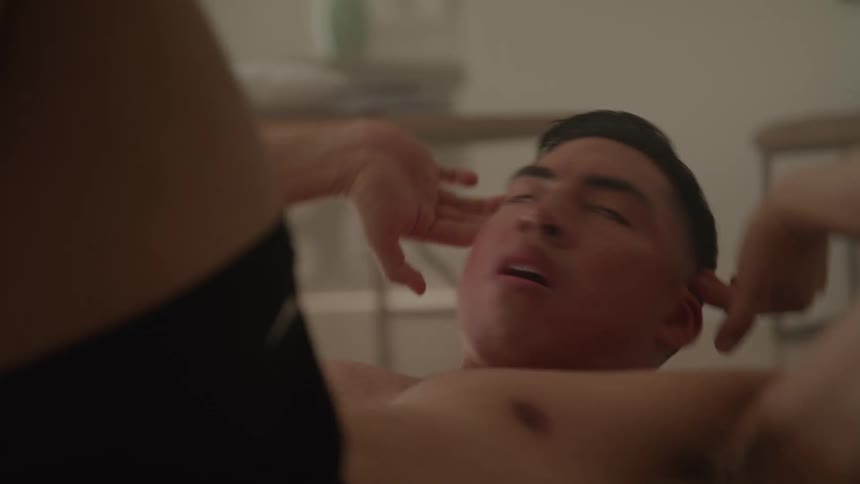 Man doing a situp exercise with hands behind his head