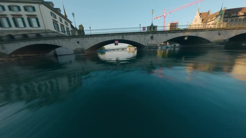 Aerial view of lake zurich with moored boats and historic buildings around