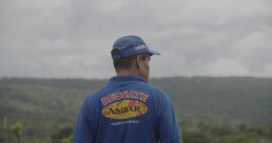 A man walks out into a field