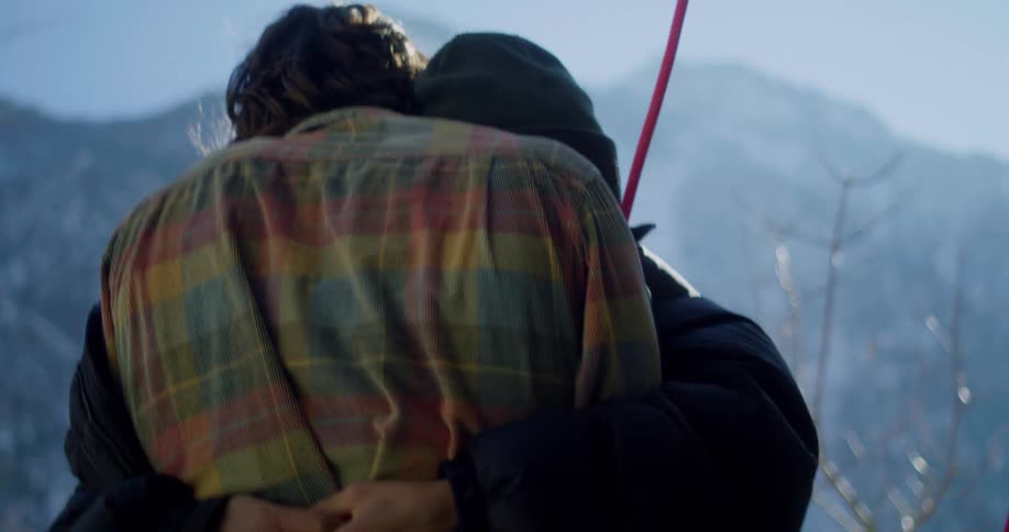 Two people hugging