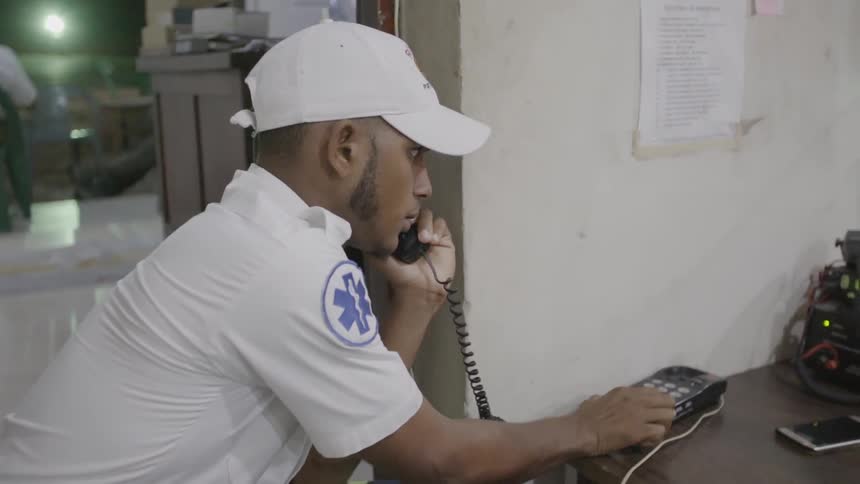 An emergency worker talks on the phone