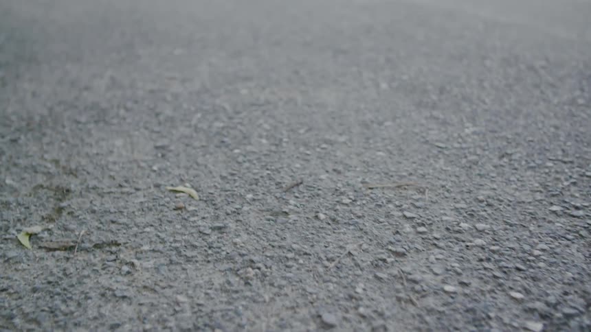 The gravel is paved on a road