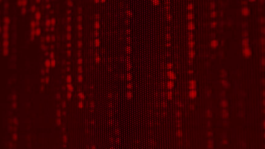 Digital code scrolls on a dark screen creating a futuristic effect