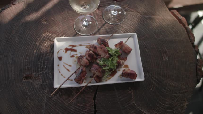 A plate is set with a glass next to it