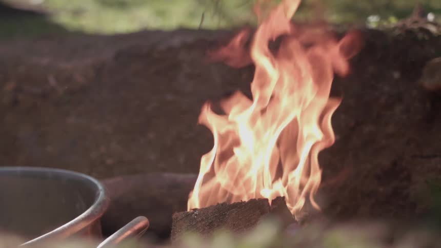 Water is being sprayed on a fire