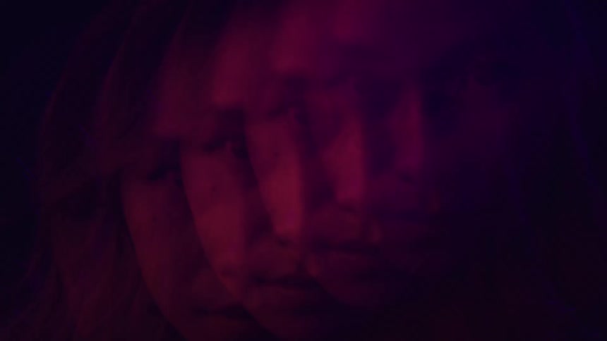The womans image is repeated and spinning
