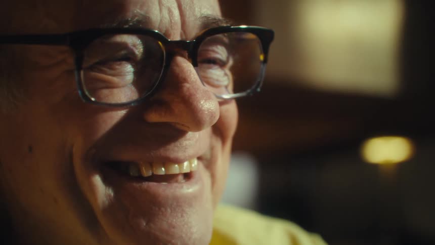 The man begins laughing