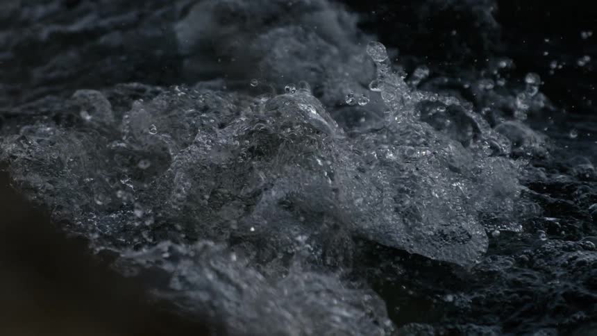 Rough waves with splashing water in motion