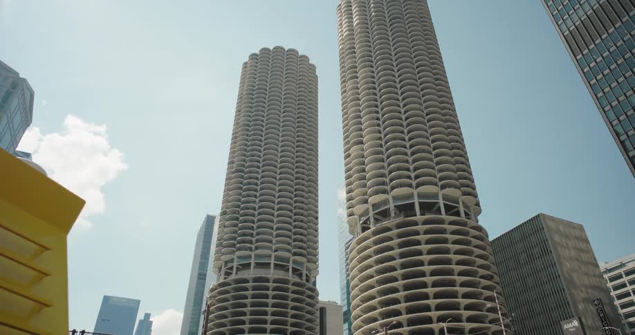 The vehicle passes by the towers