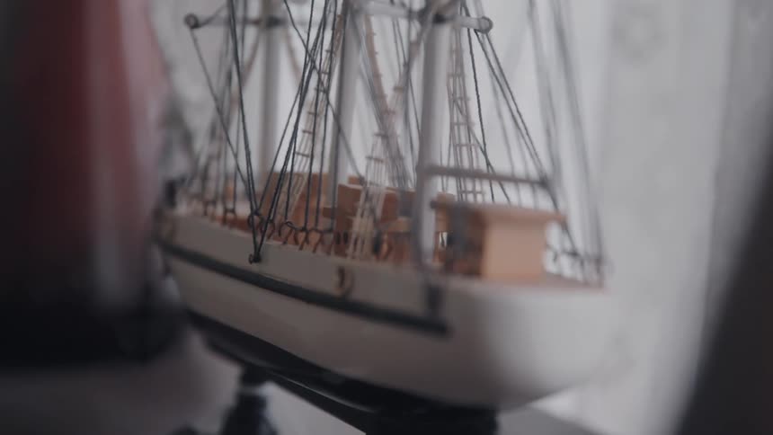 A model sailboat is on display