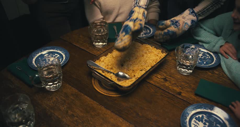 The family sat at the dinner table for supper