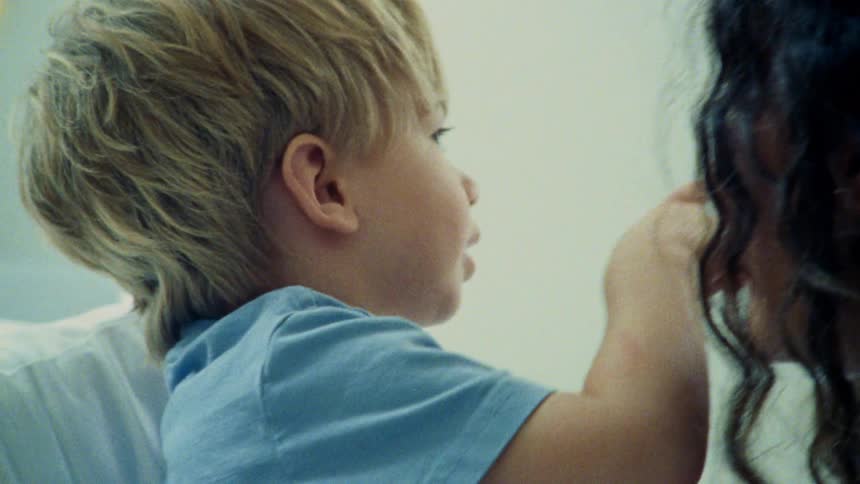 A mother is talking with her son