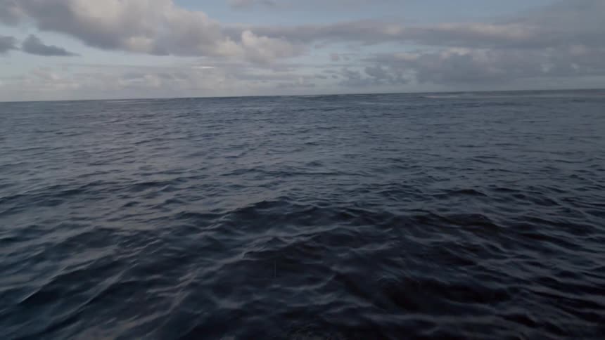 Calm ocean landscape on a partly cloudy day