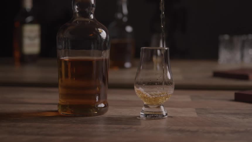 Alcohol poured into a glass