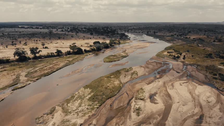 A large river cuts through the land