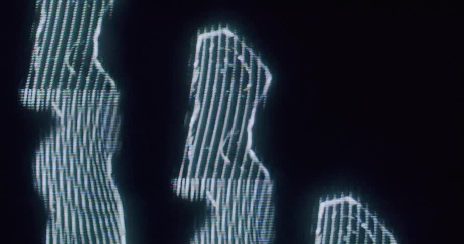 The hologram of women dancing is black and white