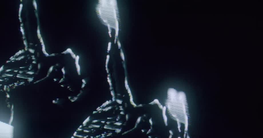 Human silhouettes outlined by glowing light streaks against a dark background