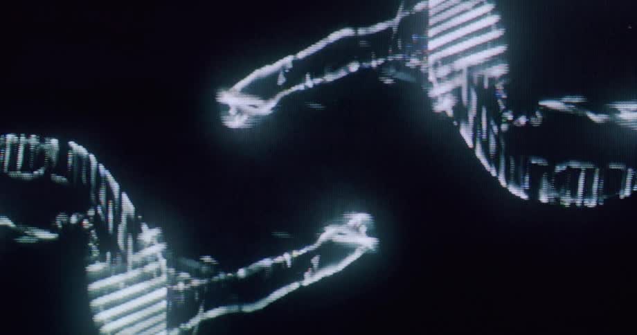 Screen displaying abstract lights against a dark background