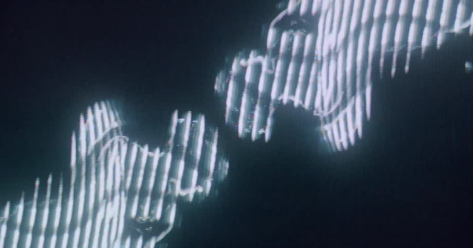 Glowing silhouettes reflected create an abstract symmetrical pattern