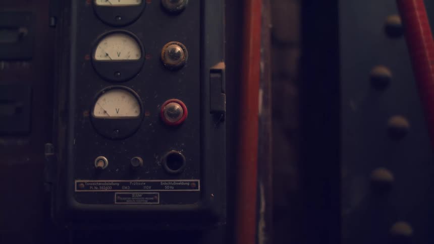 Old electrical panel with analog voltage gauges