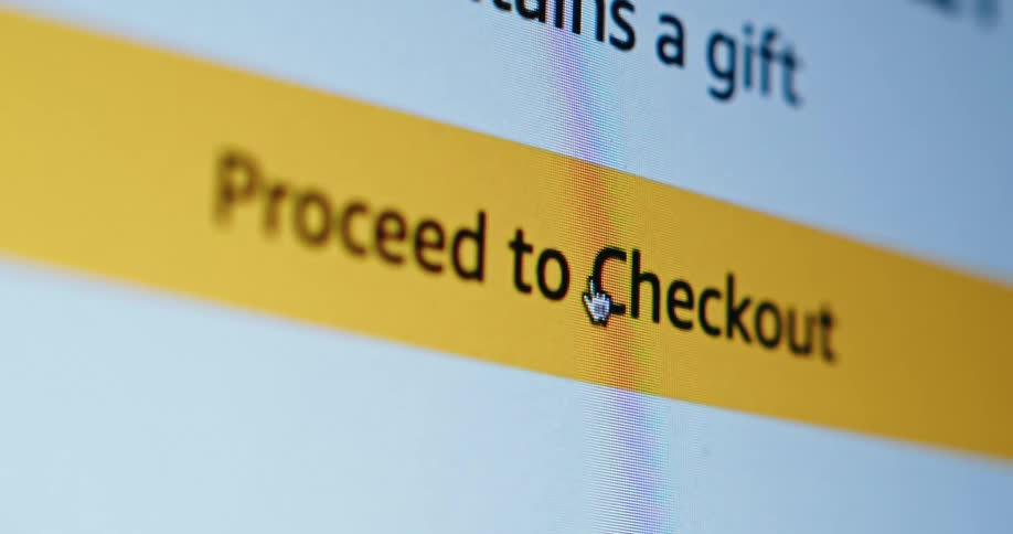 Computer screen showing cursor moving to and clicking proceed to checkout tab