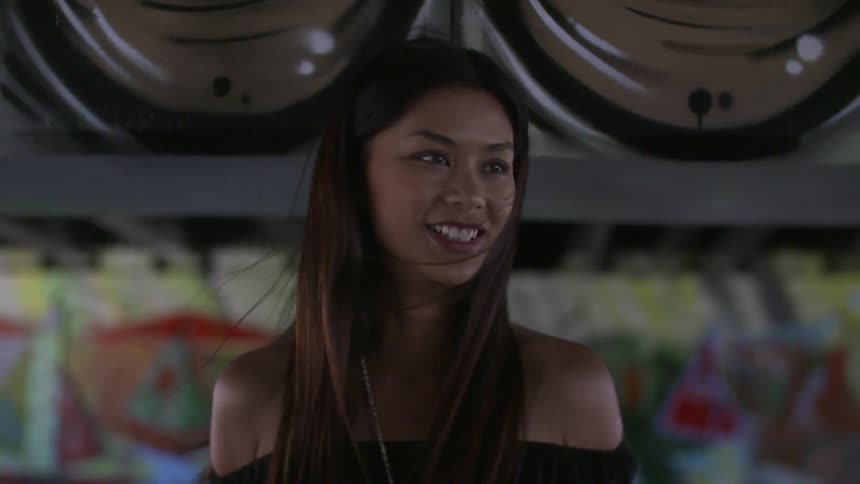 A woman smiles