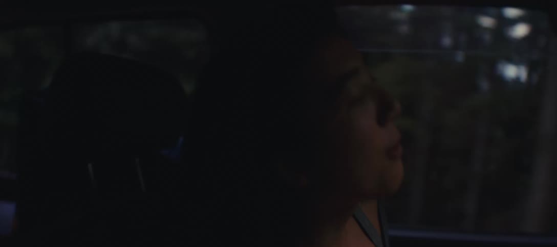 Women talk during a road trip