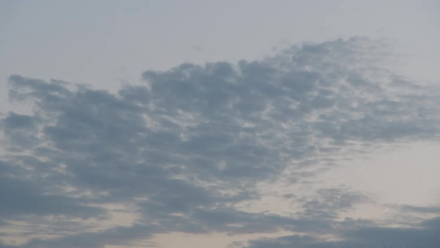 Fluffy clouds at dusk