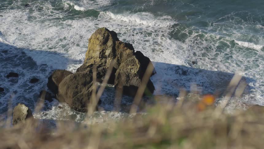 Rocky coast overlooking the foaming sea