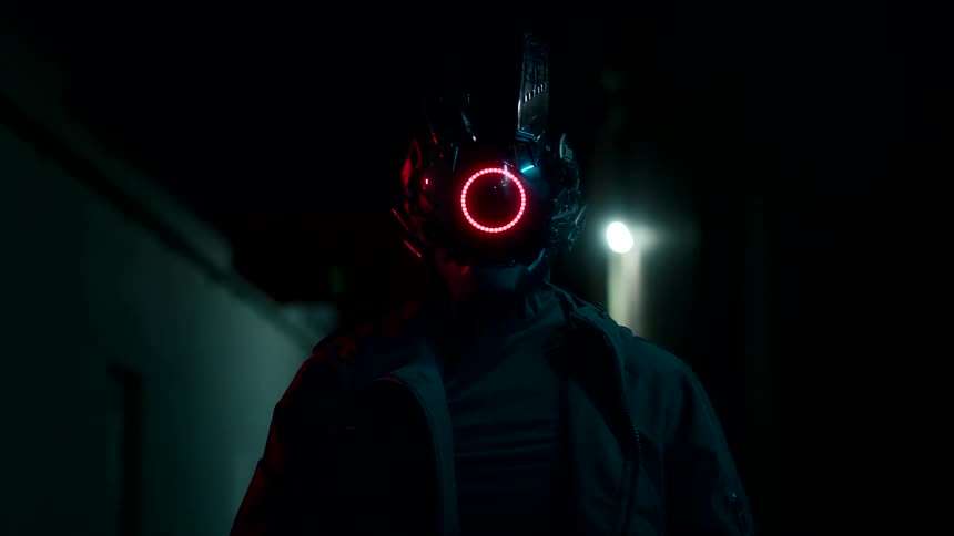 Figure with a futuristic helmet displays a circular red light in the center