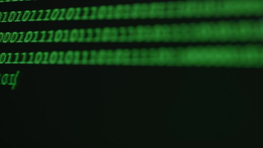 Horizontal green binary code on a dark background scrolls up the screen with a blurry bright green glow around the characters