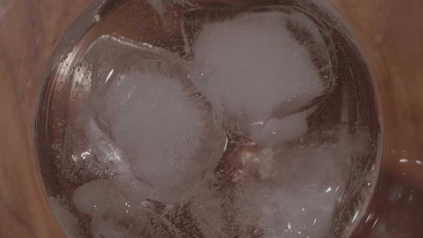 Foam and bubbles rise in the drink