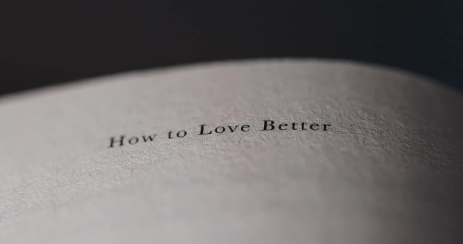 Minimal closeup of a book chapter title reading how to love better