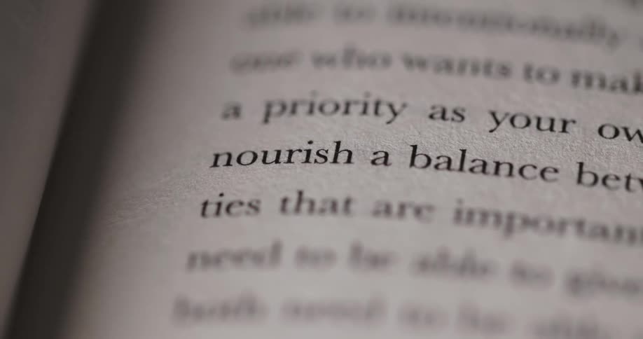 Tight macro of printed text with nourish in focus