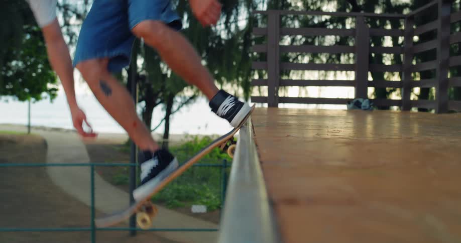 Close skate shot of a grind on the ramps coping