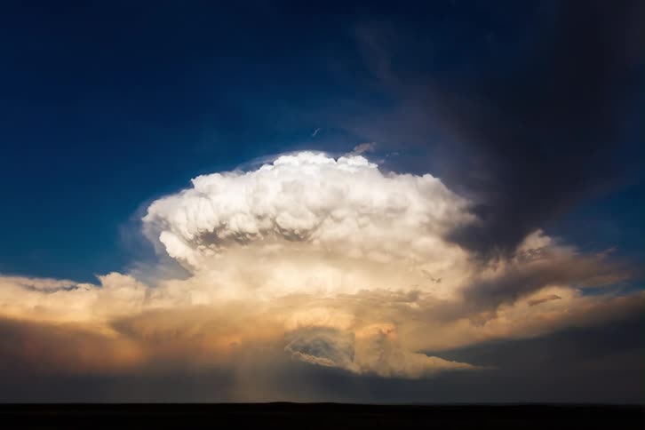 The clouds spin and move through the sky