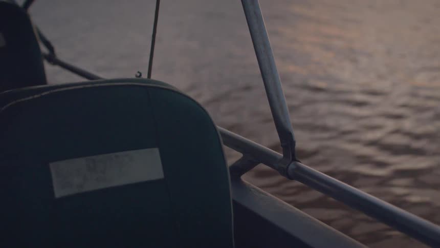 The boat is anchored in the water