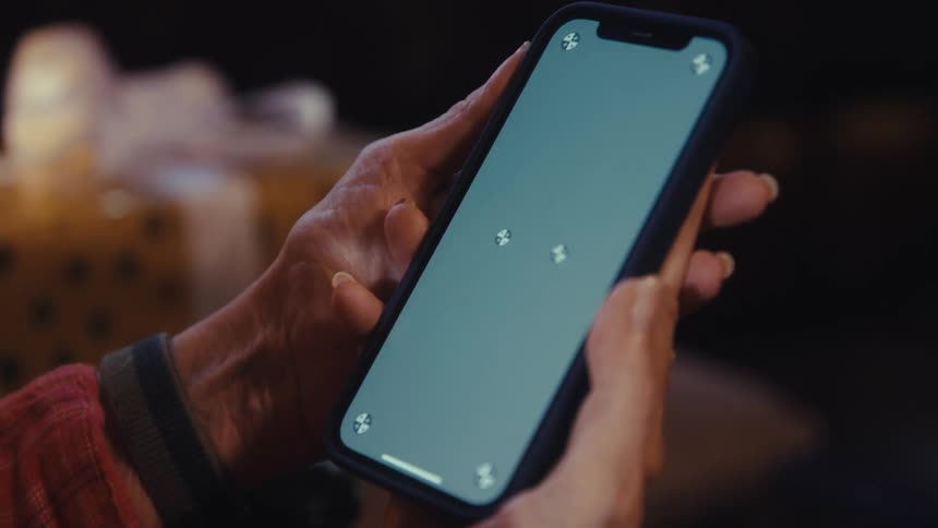 Hands holding a smartphone