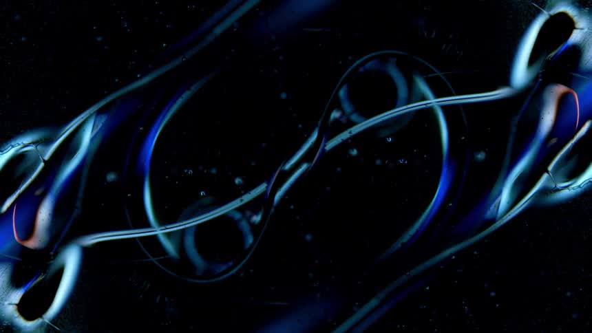 Symmetrical metallic blue abstract shape on a dark background