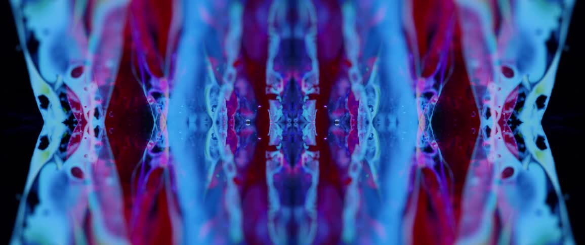 Abstract symmetrical pattern in shades of blue red and purple