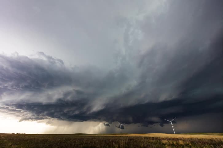The storm winds and rain spin the windmills