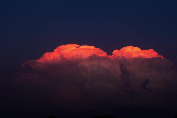 The storm clouds grow and fill the sky