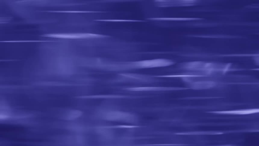 Blue surface with elongated reflections creates an effect of water movement