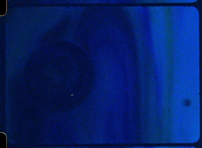 There are dark swirls in the blue paint